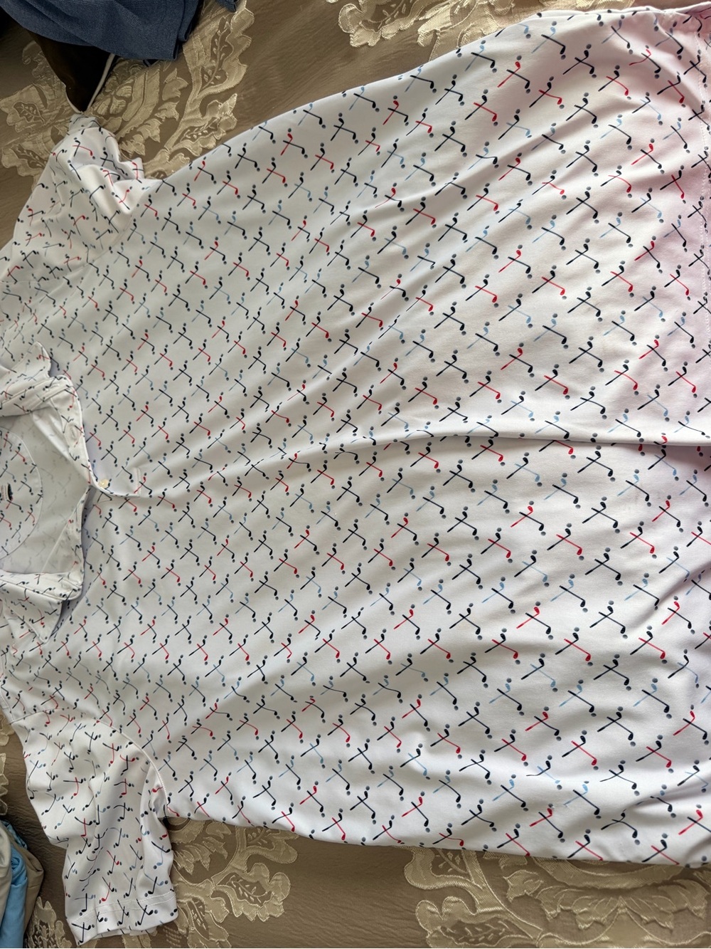 Greg Norman Collection White Polo with Red and Navy Golf Motif